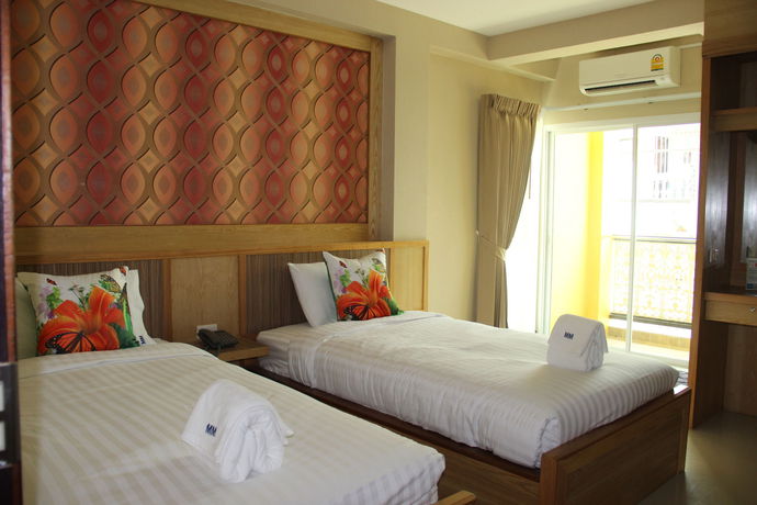 Imagen de la piscina del Hotel Monmuang and Residence. Foto 14