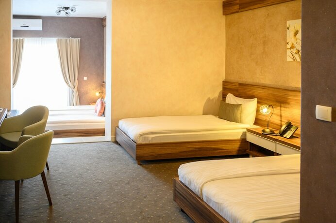 Imagen de la habitación del Hotel Monogram. Foto 15