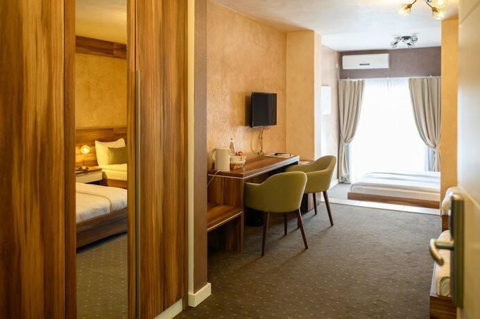 Imagen de la habitación del Hotel Monogram. Foto 16