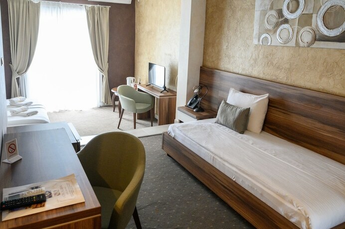 Imagen de la habitación del Hotel Monogram. Foto 19