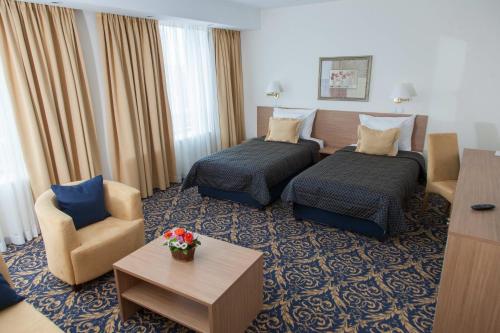 Imagen de la habitación del Hotel Monogram Park. Foto 6