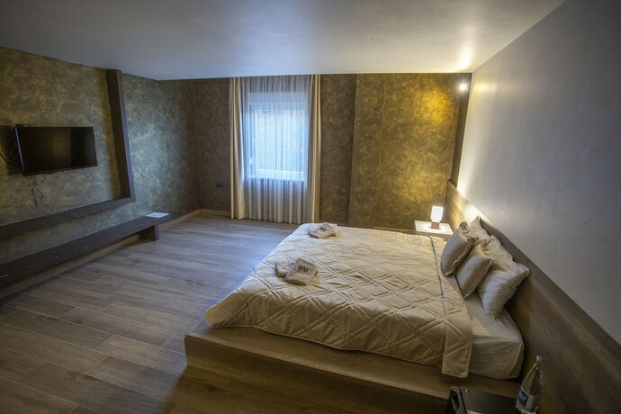 Imagen de la habitación del Hotel Monogramlux. Foto 15