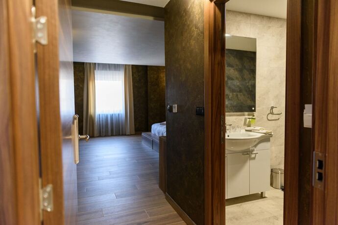 Imagen de la habitación del Hotel Monogramlux. Foto 16