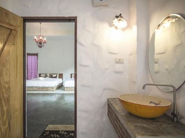 Imagen de la habitación del Hotel Monoko Porploen Resort. Foto 12