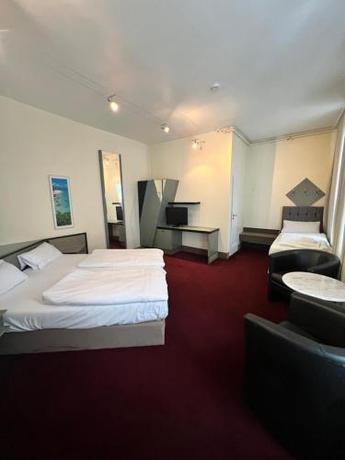 Imagen de la habitación del Hotel Monopol City Centre. Foto 14