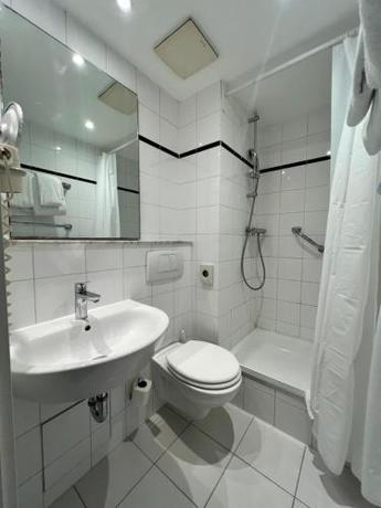 Imagen de la habitación del Hotel Monopol City Centre. Foto 15