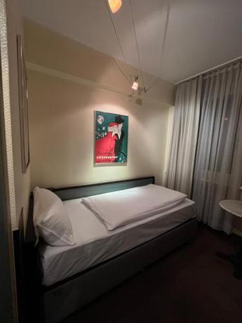 Imagen de la habitación del Hotel Monopol City Centre. Foto 18