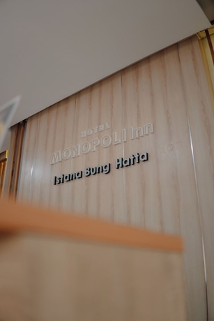 Imagen de los interiores del Hotel Monopoli Inn Bukittinggi. Foto 12