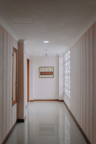 Imagen de los interiores del Hotel Monopoli Inn Bukittinggi. Foto 13