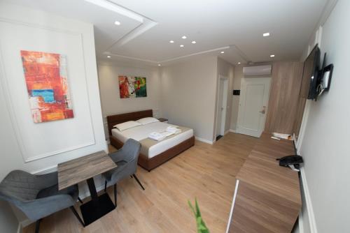 Imagen de la habitación del Hotel Monopoly. Foto 20