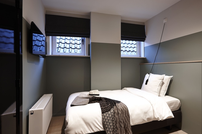 Imagen de la habitación del Hotel Monsieur Ernest. Foto 6