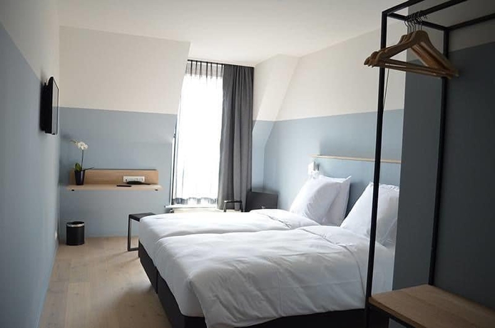 Imagen de la habitación del Hotel Monsieur Ernest. Foto 9