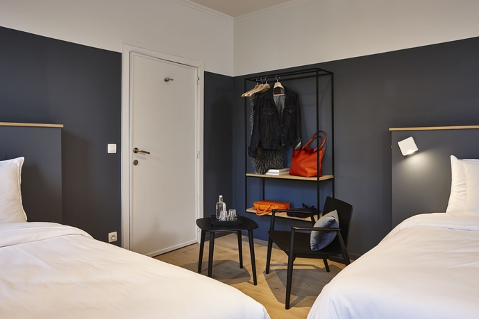 Imagen de la habitación del Hotel Monsieur Ernest. Foto 11