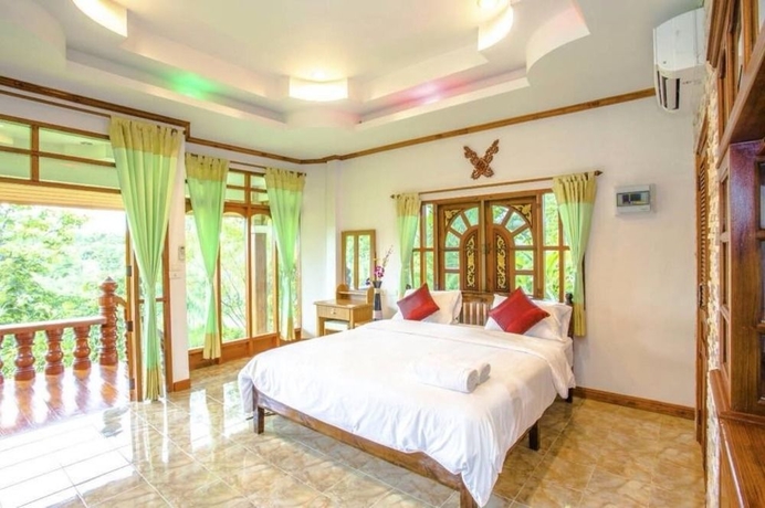 Imagen de la habitación del Hotel Mont Goei Pai. Foto 2