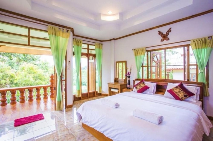Imagen de la habitación del Hotel Mont Goei Pai. Foto 5