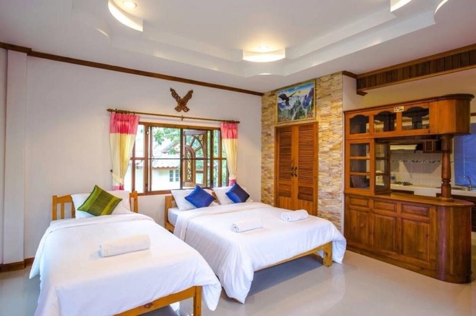 Imagen de la habitación del Hotel Mont Goei Pai. Foto 6