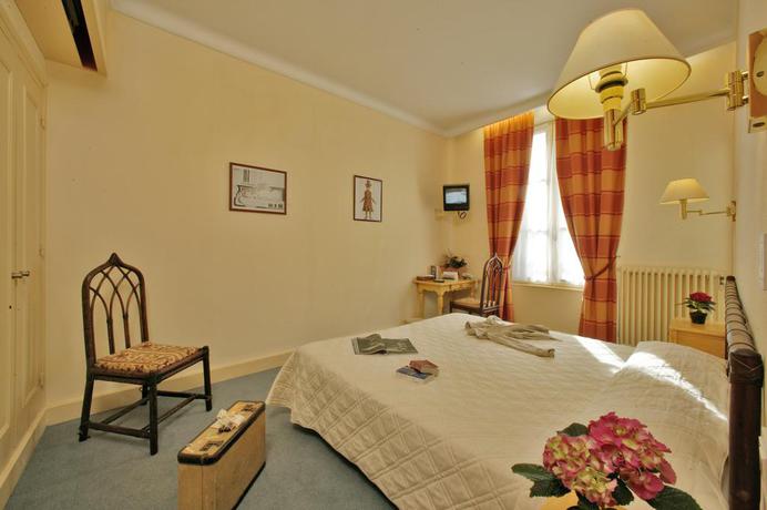 Imagen de la habitación del Hotel Montaigne, Le Moulin à Vent. Foto 5