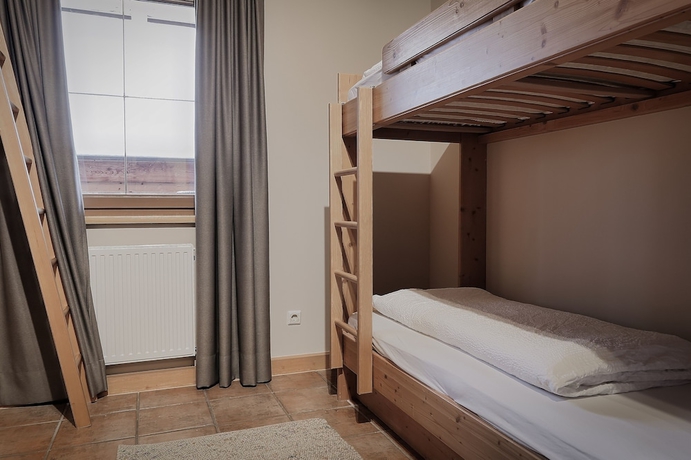 Imagen de la habitación del Hotel Montana Apartments. Foto 11