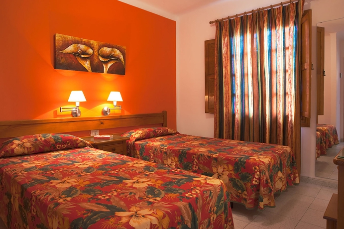 Imagen de la habitación del Hotel Montana Club Suite. Foto 11