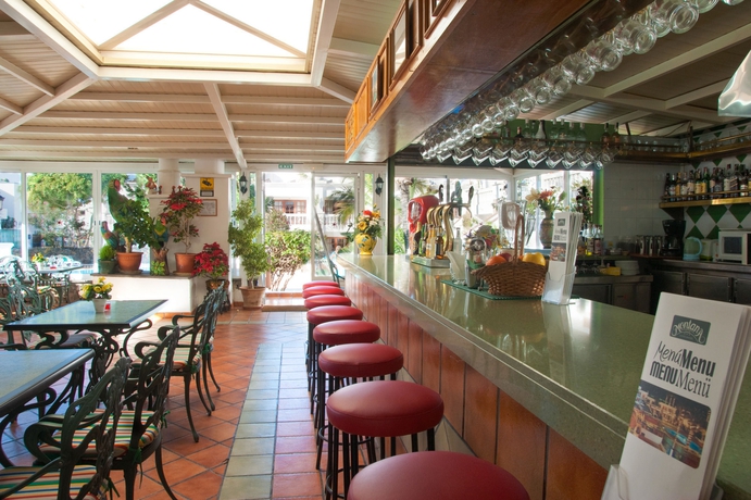 Imagen del bar/restaurante del Hotel Montana Club Suite. Foto 7