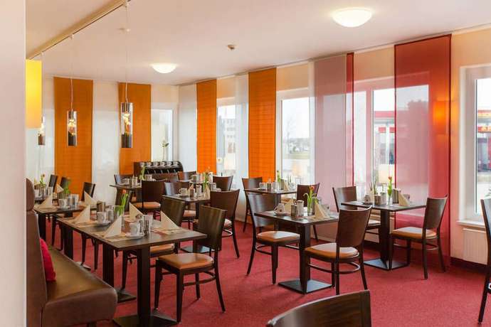 Imagen del bar/restaurante del Hotel Montana Ellwangen. Foto 2
