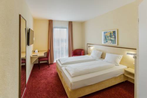 Imagen de la habitación del Hotel Montana Limburg. Foto 2