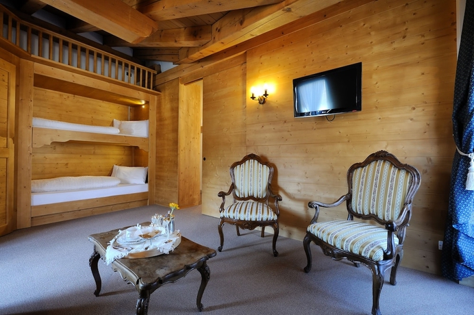 Imagen de la habitación del Hotel Montana, Madonna di Campiglio. Foto 13