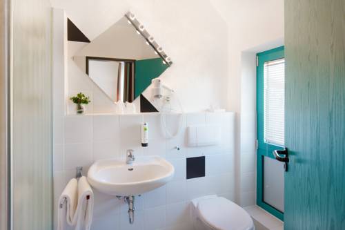 Imagen de la habitación del Hotel Montana Trend Lehrte. Foto 7