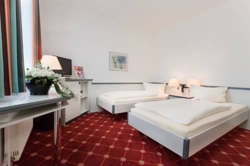 Imagen de la habitación del Hotel Montana Trend Lehrte. Foto 10