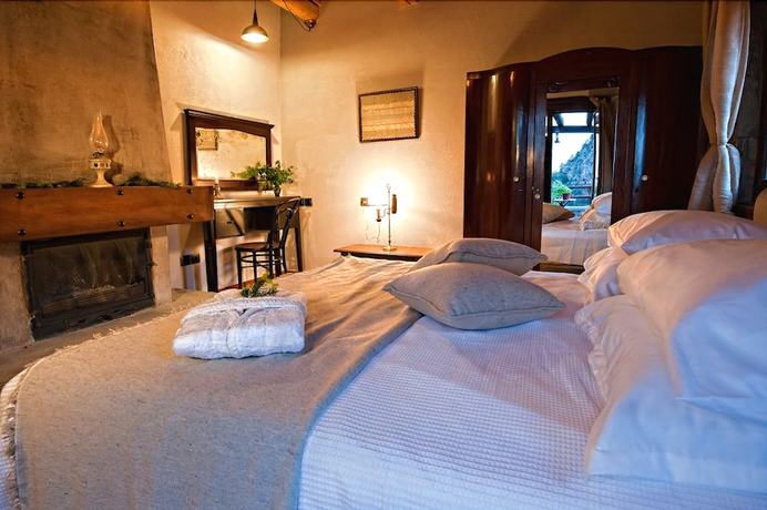 Imagen de la habitación del Hotel Montanema Handmade Village. Foto 14