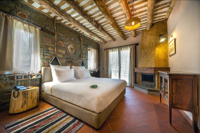 Imagen de la habitación del Hotel Montanema Handmade Village. Foto 16