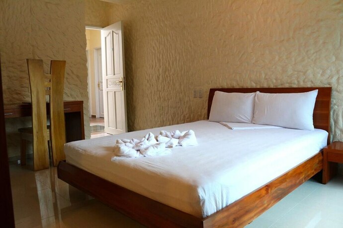 Imagen de la habitación del Hotel Montani Beach Resort. Foto 13