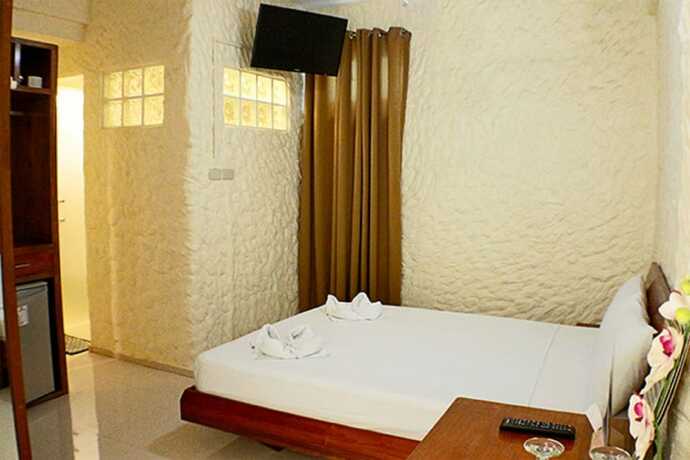 Imagen de la habitación del Hotel Montani Beach Resort. Foto 14