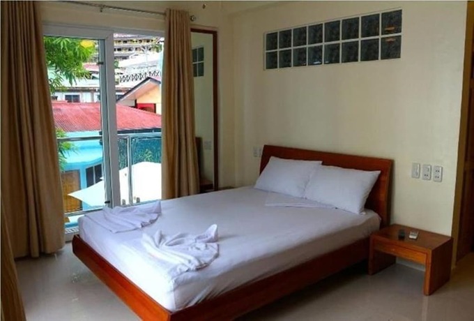 Imagen de la habitación del Hotel Montani Beach Resort. Foto 17