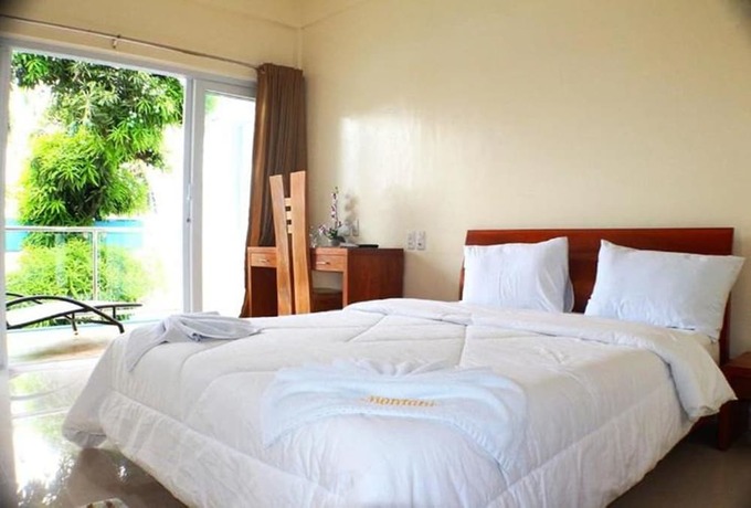 Imagen de la habitación del Hotel Montani Beach Resort. Foto 24