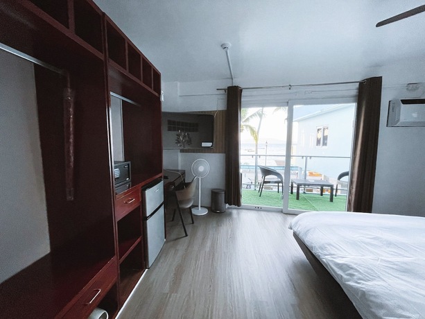 Imagen de la habitación del Hotel Montani Beach Resort. Foto 27