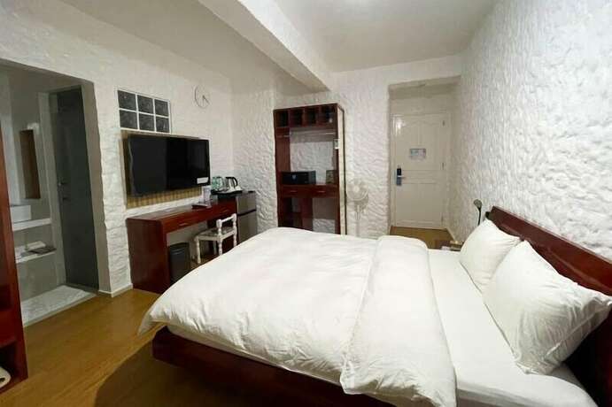 Imagen de la habitación del Hotel Montani Beach Resort. Foto 28