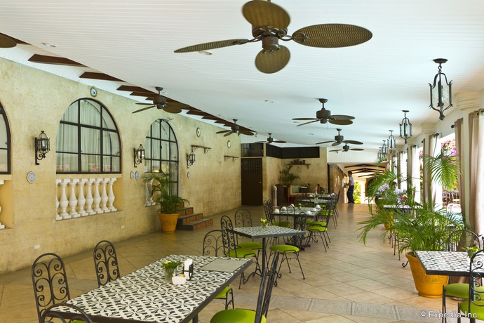 Imagen del bar/restaurante del Hotel Montebello Villa. Foto 2