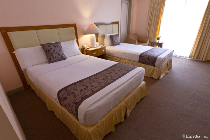 Imagen de la habitación del Hotel Montebello Villa. Foto 8