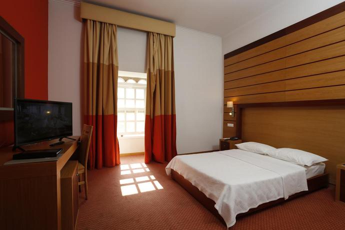 Imagen de la habitación del Hotel Montebelo Palácio Dos Melos Viseu Historic. Foto 11