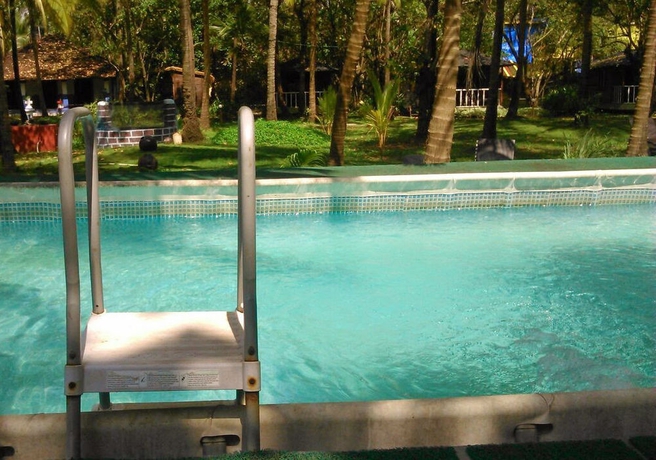 Imagen de la piscina del Hotel Montego Bay Beach Village. Foto 13