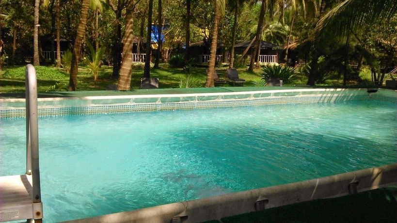 Imagen de la piscina del Hotel Montego Bay Beach Village. Foto 16