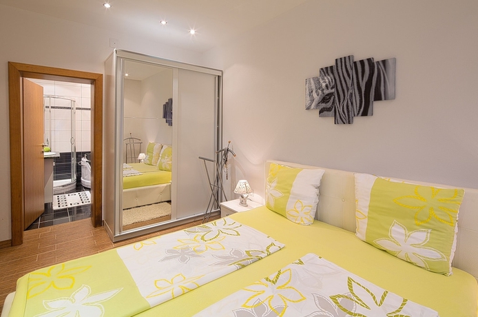 Imagen de la habitación del Hotel Montelux Apartments. Foto 6