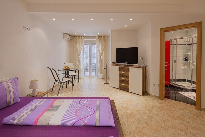 Imagen de la habitación del Hotel Montelux Apartments. Foto 8