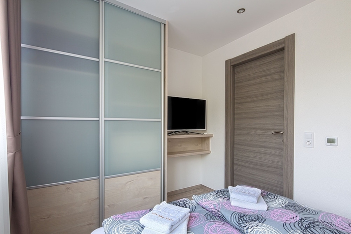 Imagen de la habitación del Hotel Montelux Apartments. Foto 12