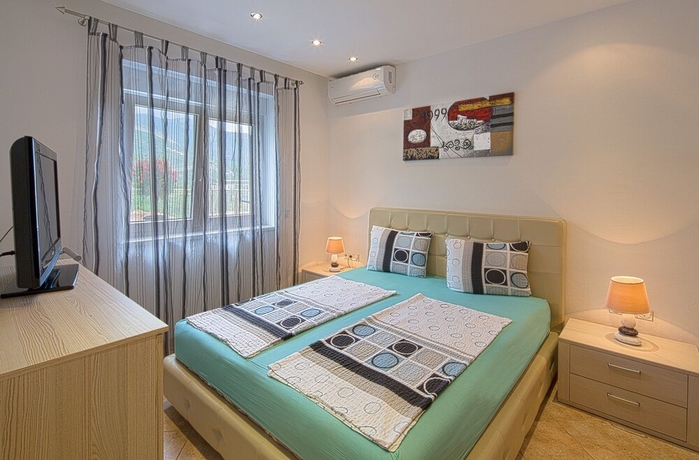 Imagen de la habitación del Hotel Montelux Apartments. Foto 15