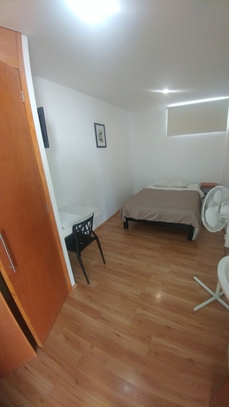 Imagen de la habitación del Hotel Montemorelos Suites. Foto 2