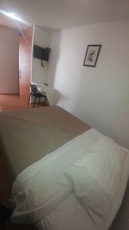 Imagen de la habitación del Hotel Montemorelos Suites. Foto 3
