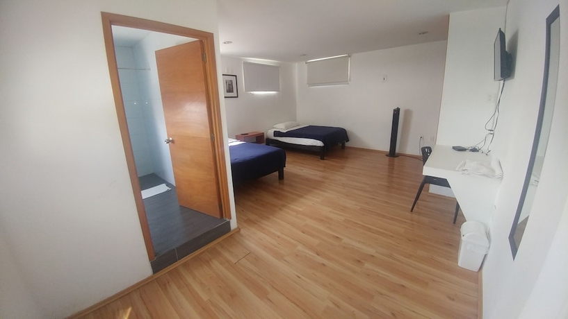 Imagen de la habitación del Hotel Montemorelos Suites. Foto 6