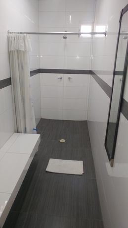 Imagen de la habitación del Hotel Montemorelos Suites. Foto 8